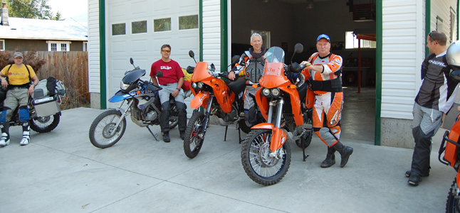 Rich Hamilton (center left) and Gary DeBlock (center right) pose with three friends who were going to accompany them part way on their off-road trip down the Continental Divide to Mexico Friday. David F. Rooney photo