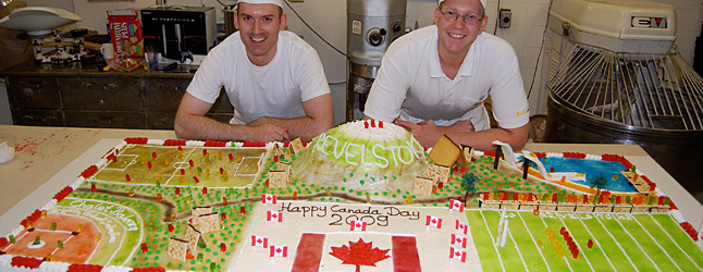 Chalet Bakers Sebastian Bucher (left) and Michael Dopfer (right) pose with their Canada Day masterpiece. David F. Rooney photo