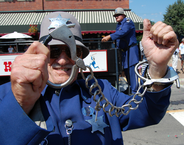 This Keystone Kop was all set to slap the cuffs on a photographer during the parade. David F. Rooney photo