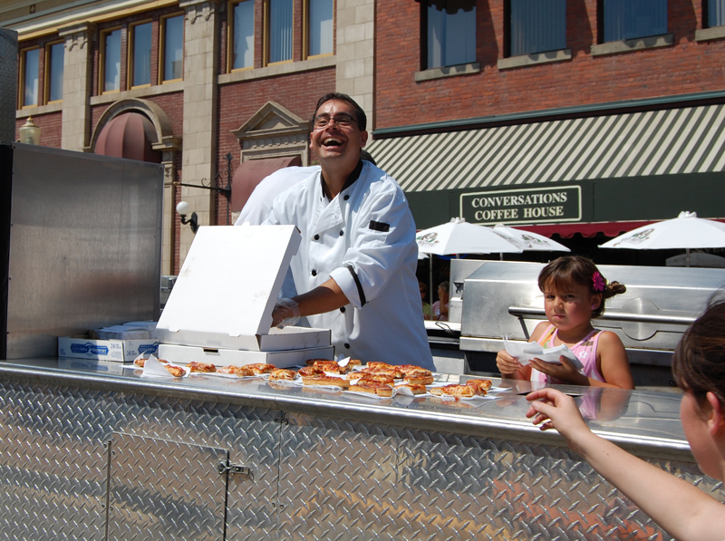 And what would you like on that pizza? The people in the Zala's float served it up fresh to kids in the crowd along the parade route. David F. Rooney photo