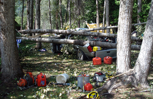 Unless you're close enough to town to head home for the night you get to camp out a LOT when you're firefighter and that sometimes poses risks. This is what happened to the campsite at Eagle River Campground by the Skyline when a windstorm blew trees onto the trucks and tents owner by a crew of firefighters from Ontario. Fortunately, only one person — a female firefighter — was injured. She suffered a broken leg when a tree hit her tent. Photo courtesy of Ben Parsons