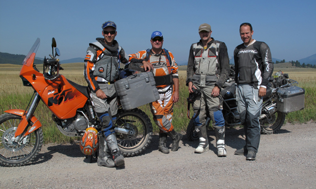 Rich Hamilton (left) and Gary DeBlock (center) pose with two friends somewhere in Montana. Photo courtesy of Robin Suopanki