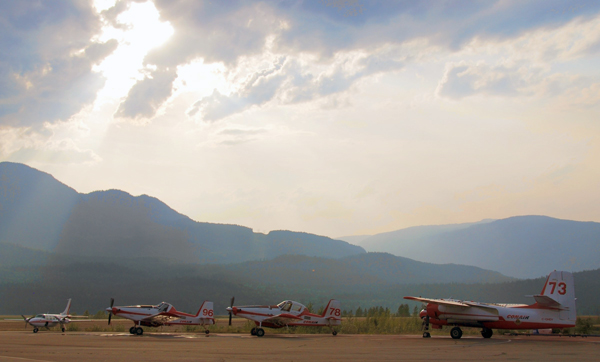 BC Forest Service Air tankers at Revelstoke Airport await their next dispatch. Simon Hunt photo courtesy of Parks Canada