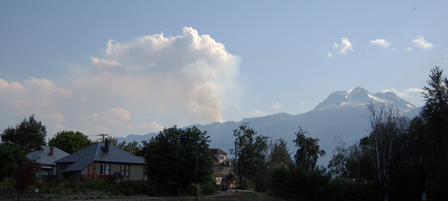 Smoke rises from a small forest fire behind Mount Begbie. Other fires have been responded to at Mulvehill Creek, Big Mouthe Creek south of Mica and, of course, the big ones our area at Galena Bay and Beaton-Incommapleux. David F. Rooney photo