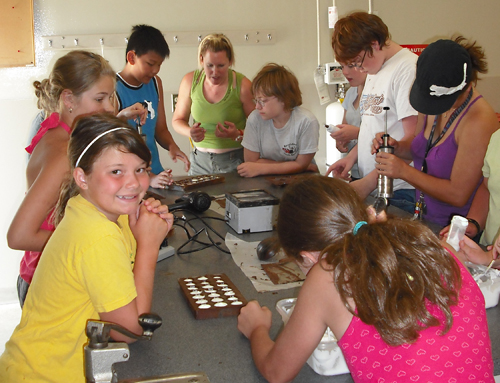 Kids enrolled in the Community Connections Pre-Teen Camp enjoyed this particular activity — a "hands-on" class in how to make chocolates with Chocolate Summit chocolatier Wendy Mulligan.  Photo courtesy of Anne Corrie