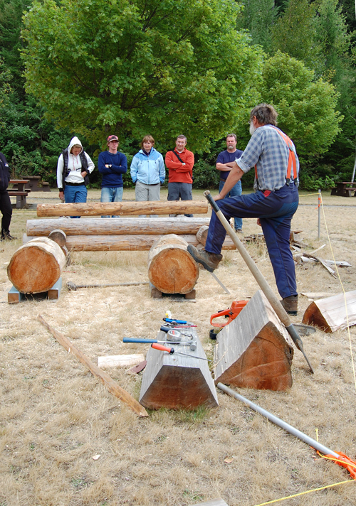 Brian Sumner talks with visitors to the BC Interior Forestry Museum about log-cabin building. David F. Rooney photo