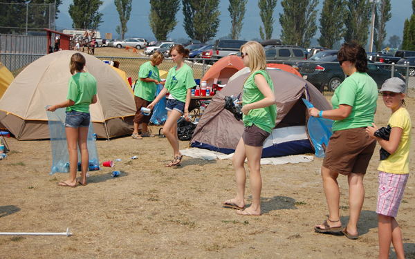 Cathy McKee (second from the right) oversees a cleanup crew at one of the campgrounds at Centennial Park. David F. Rooney photo 