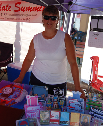 Jane Lowey of Scrap Attic poses with some of her wares at the Farmer's Market. You can reach Jane via e-mail at scrap-attic@hotmail.com. David F. Rooney photo