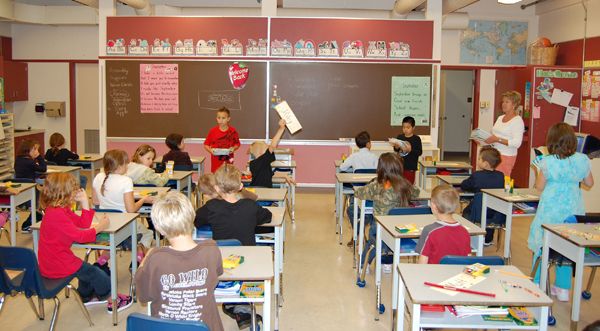 Mount Begbie's Jill Leslie had everything under control in her Grade Three class. Heck they were even raising their hands politely when they wanted attention. David F. Rooney photo