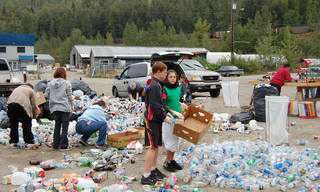 Volunteers sorted through hundreds, maybe even thousands, of bottles and cans donated to the Shotokan Karate Club for it's bottle drive last Thursday. Sensei Chic Sharp said the club holds three bottle drives a year to help pay for its activities including its annual Christmas-in-March event, a $1,000 scholarship and to defray the cost of sending a team to the Shotokan World Championships. David F. Rooney photo