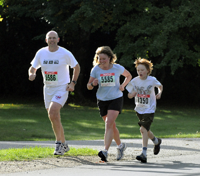 Richard, Penny and Simon Brittin run together during the Community Run on Saturday. Photo courtesy of Karyn Molder