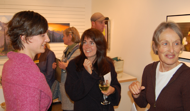 Artist Rachel Kelly (left) talks with Lisa Canilla-Sykes and Gwen Battersby at the opening. More than 250 people attended the event. David F. Rooney photo