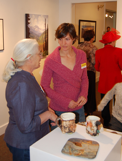 Artists and exhibitors Sandra Flood (left and Rachel Kelly chat during the show. David F. Rooney photo