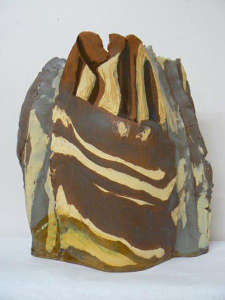 A potter and experienced artist in several media, Sandra Flood saw the trip as a chane to produce "work (that) begins to explore some of the things I saw. I experiment with the physical and tensile properties of clay and manipulate glazes to produce not imitation rocks but the feelings and visual references that they evoked." Image courtesy of the Revelstoke Visual Arts Centre