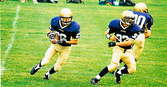 Pierre-Luc Lord (left) carries the ball during a recent football BC Minor Football Association game. Like a lot of young men he loves football. The difference between him and others here in Revelstoke is that his parents drive to and from Salmon Arm three time a week for practice and at least as far on Sundays for games. The team he's playing for? The Salmon Arm Chargers. He'd love to play here but Revelstoke doesn't have a team. Photo courtesy of Shawn Lord