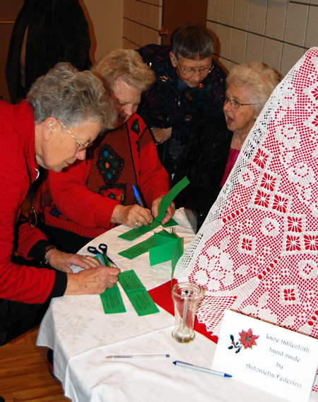 This lace table cloth was a hot draw item at the St. Francis of Assissi Christmas Bazaar and Tea on Saturday. David F. Rooney photo