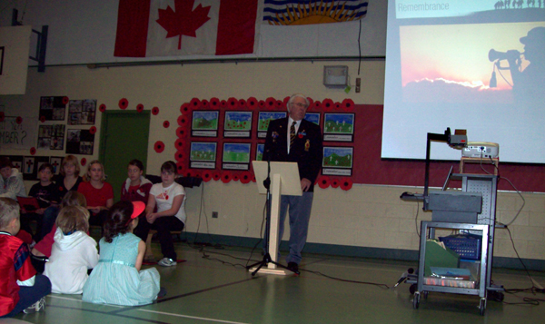 John Opra, a veteran of the Second World War and former Royal Canadian Legion branch president spoke to students at Columbia Park Elementary on Tuesday about the importance of remembering our war dead. Photos by student photographers Kelsey Marsh and Leah Humphreys