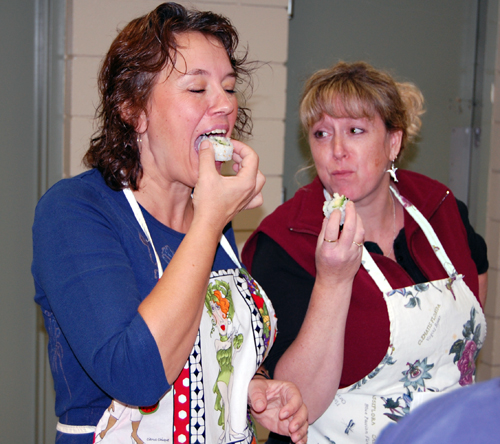 Zoe Humphries and Carol Fitchett savour the fresh taste of sushi they prepared with their own hands. David F. Rooney photo