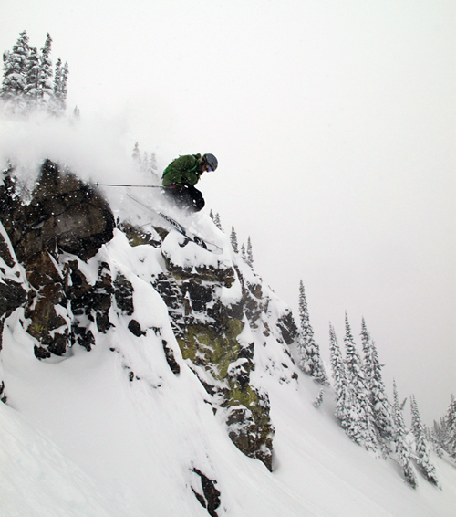 Dan Treadway zips over a ledge leaving a contrail of powder behind him. Photo courtesy of Karilyn Kempton/Revelstoke Mountain Resort