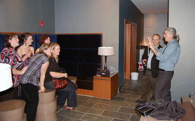 These young ladies (left) decided to take a chance of Steve Kent's skill with a point-and-shoot. Fortunately, Mayor David Raven was also on hand to provide a little guidance. David F. Rooney photo