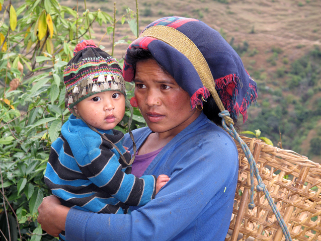 A Nepalese woman holds her child. Photo courtesy of Laura Stovel