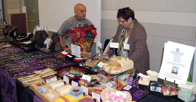 Satish and Patti Shonek had lots of jewellery and hand-made soap and other lovely baubles for sale at their Sugandh Mountain Trading and Soapworks Company table.  David F. Rooney photo