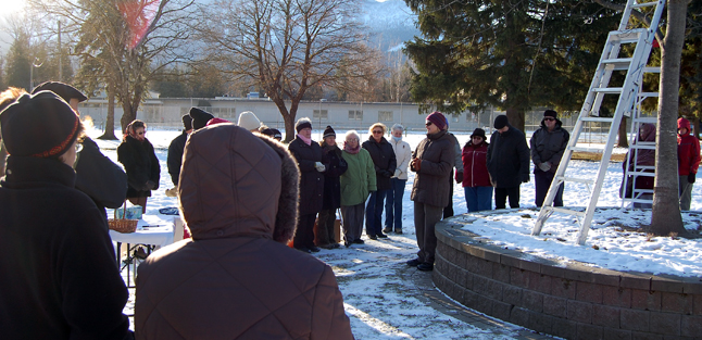 Vivian Mitchell speaks to the crowd of about 50 people who turned out for the Revelstoke Hospice Society's annual Snowflake Ceremony at Queen Elizabeth Park on Sunday. David F. Rooney photo