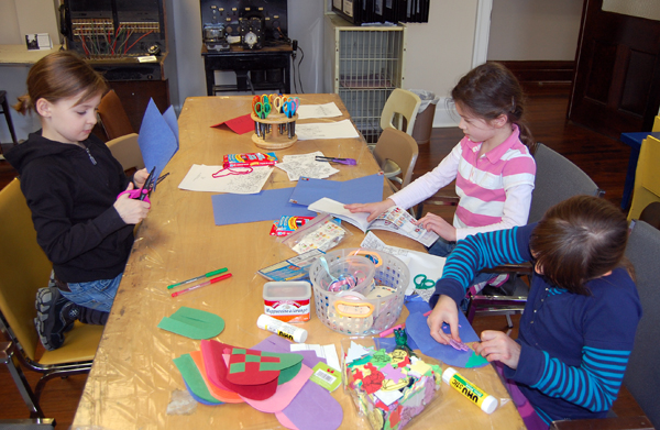 These three young ladies were busy making very creative original Christmas cards for their families. David F. Rooney photo