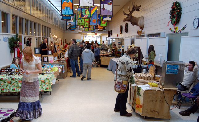 Customers wander through the stalls at the Winter Farmers' Market on Saturday. David F. Rooney photo