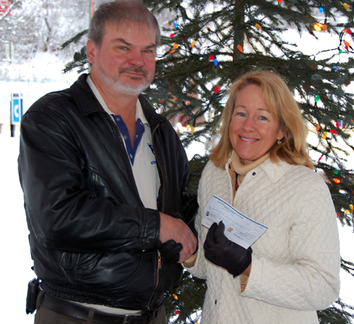 Bruce Ross (left) of the Knights of Pythias presented Brenda Kessler, executive director of the Revelstoke Hospice Society, with a cheque for $4,000 on Wednesday. Hospice needs about $26,000 a year to continue offering hospice services in our community and is hard pressed to secure ongoing financial support. It was one of the organizations that was hit hard by the provincial government's decision to deny grants to community organizations this past autumn so the generosity of the Knights of Pythias was particularly appreciated. "It's all about service," Ross said. "It costs our members about three hours a week to but the return in terms of making our community a better place to live is incalculable." David F. Rooney photo