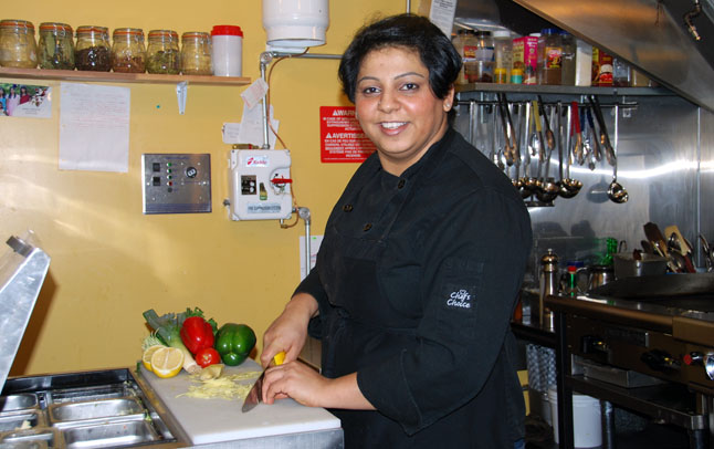 Goldie Sanghera at work in Paramjit's Kitchen. Leslie Savage photo