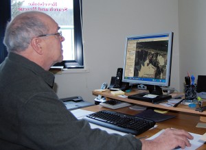 Wally Mohn of Revelstoke Search and Rescue examines a Google Earth image of the portion of Greely Bowl where an out of bounds skier from Sweden fell 100 feet. The man sustained back and rib injuries but would have been killed if he hadn't landed on a ledge. David F. Rooney photo