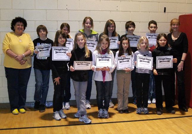 These students participated in a class Spelling  Bee and were the top three spellers in their class. The top three spellers in grades 4-7 then went on to the school Spelling Bee finals held on Tuesday morning Jan. 12 in front of the entire school. The top speller was Charlie Sykes who is now going to Kamloops for the regional Spelling Bee. Good Luck Charlie! A big thanks to Mrs. Russell, Mrs. Just, Mrs. Fujino and Mr. Hicks for organizing and judging this competition. In the back row left to right: Mrs. Russell, Callum Hicks, StefanieWallach, Shayna Seyl, Sage Riegel, Charlie Sykes, Cole Blakely, and Mrs. Just.  In the front row left to right: Sydney Higgins, Erin Behncke, Lainey Thur, Zoe Kramer, Kate Granstrom, Alana Brittin. Photo by student photographer Jacqueline Cottingham