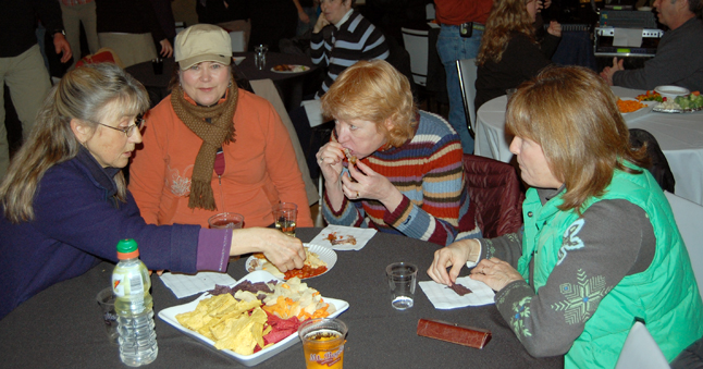 Heather Duchman (center, left) gives the photographer the Evil Eye as he snaps a photo of her, Barb Little (left), Barb Kemmerer and Chris McMillan.  David F. Rooney photo