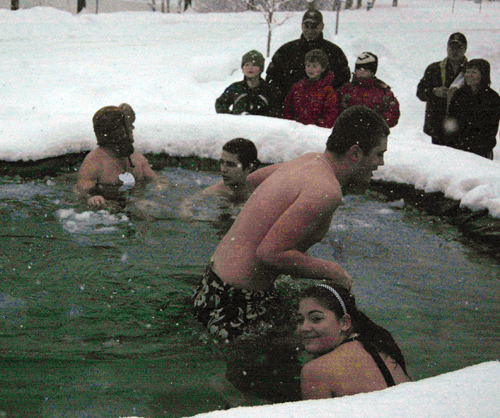 A plunger who can't take any more breaks for the ice-block steps that lead out of the pool. Most people couldn't stay in the water for more than a couple of minutes. David F. Rooney photo