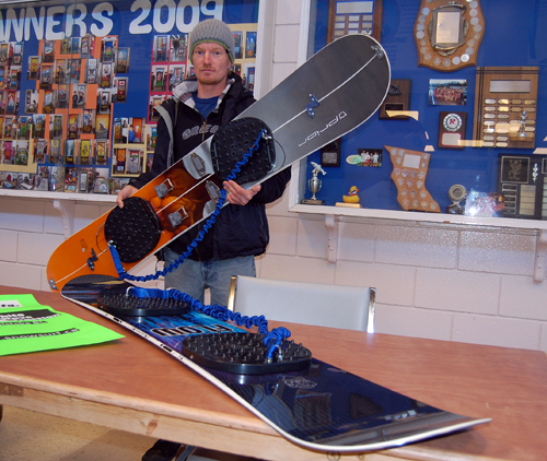 Nikolai Samson poses with boards fitted with his White Wave Traction pads. David F. Rooney photo