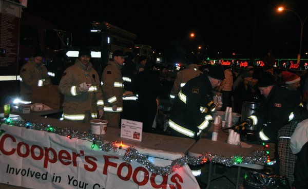 Revelstoke's firefighters kept warm by beeing busy handing out coffee, cocoa and other consumables.  David F. Rooney photo