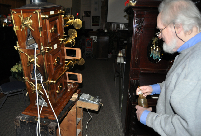 Nickelodeon Museum Proprietor David Evans overhauls his Victorian magic lantern for this week's Grand Victorian Christmas on Friday and Saturday. This wonderful family event is fast-becoming a Christmas tradition in Revelstoke. David F. Rooney photo