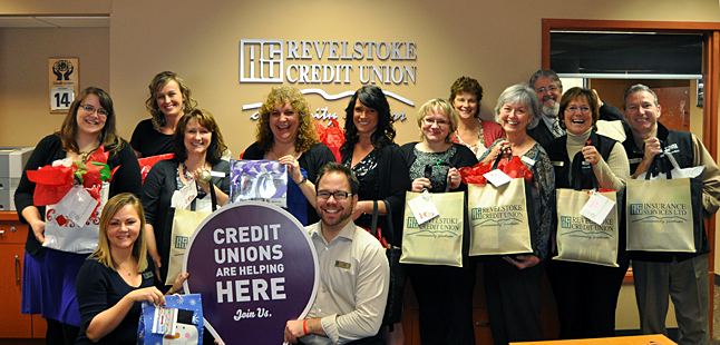 The Revelstoke Credit Union and its staff put together scads of Christmas gift bags every year. As you can clearly see they truly enjoy helping people in our community.  David F. Rooney photo