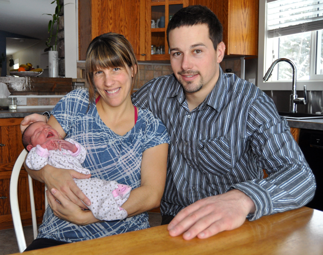 Meet Revelstoke's newest citizen: Miss Anika Raasch posing here with her parents Marie-Claude de Launiere and Quintin Raasch. Anika was born just two days ago at on January 2 at 6:55 pm at Queen Victoria Hospital. David F. Rooney photo