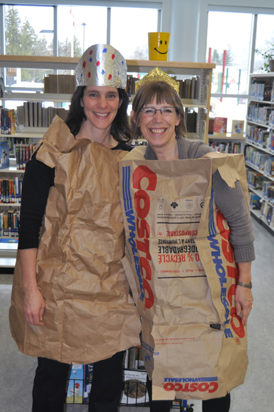 Literacy Day at Mount Begbie View Elementary saw staff and kids wearing costumes modelled on their favourite literary characters. Here, Principal Jane Morris (right) and Teacher-Librarian Eleanor Wilson came dressed as Paper Bag Princesses. It was a fun and fitting beginning to Jane's tenure as the new BVE principal. She replaced Shan Jorgenson-Adam on Friday. Shan had to leave Revelstoke because her husband is seriously ill and requires treatment in Edmonton. David F. Rooney photo