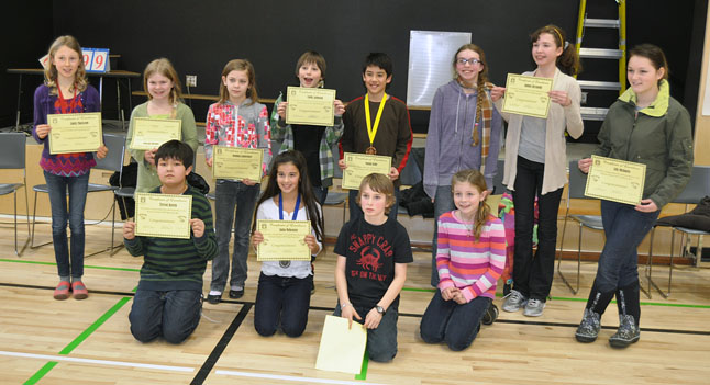 And here are all the contestants! The top three spellers were Emily MacLeod (left, in back), Julia McKenzie (second from the left in front) and Nolan Gale (back row, center). The other competitors are Lily Michaels, Amelia Brown, Trevor Kozek, Makenna McLaughlin, Colby Johnson, Jaimie Reynolds, Alice Dunkerson, Lane Bull and Sophia Laurence. David F. Rooney photo