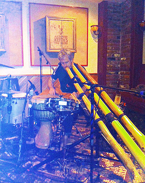 Shane Philip plays the didgeridoo during his sell-out performance at the Last Drop Pub on Thursday. Cellphone camera photo by Emma Kirkland