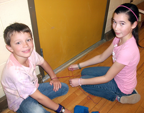 James Vopni and Zoe Kramer were making friendship bracelets for each other for anti-bullying Day at AHE on February 27.  Everybody wore pink to show support for the school as a bully-free zone. Photo by Student Photographer Julian Corbett