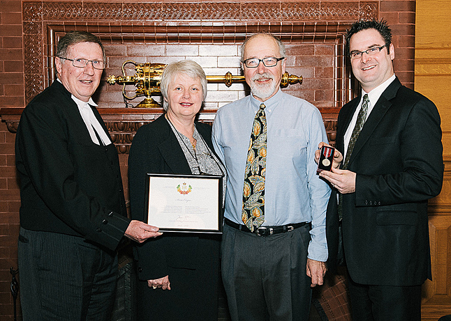 Former SD 19 Superintendent Anne Cooper was honoured with a Queen’s Diamond Jubilee Medal presented to her by Speaker of the House Bill Barisoff (left) and Education Minister Don McRae (right) during a visit to Victoria last week. Cooper, shown here with her husband Bob, received the distinction because of her contribution the public education system in this province. While superintendent of Revelstoke’s school system Cooper oversaw the development of a number of education initiatives that have combined to help make SD 19 one of the best school systems in the province. Photo courtesy of the Government of British Columbia