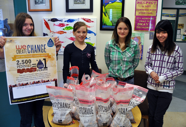 Columbia Park Elementary Grade Seven girls Cassi Stoller (left), Ariana Burke, Lily Michaels and Kirby Webb (right) organized a penny drive last month that pulled in 47,000 of the one-cent coins. Each of the 19 heavy-duty bags in front contains $25 worth of pennies, said Kirby Webb. That's a lot of pennies and they “came just from Columbia Park Elementary,” said Cassi Stoller. Her classmate Ariana Burke said “people gave us bags and bags and bags of pennies.” These heavy-duty bags are to be taken to the Royal Bank and the money will go to a Free The Children Campaign to provide clean water for life to 100,000 people. The pennies these kids have collected are enough, according to the campaign website at http://www.freethechildren.com/get-involved/campaigns/we-create-change/, to provide clean water to 20 people for life. That may not sound like a lot but think about how you can change people’s lives when they no longer have to worry about being infected with crippling water-borne parasites. Lily Michaels said the collection began on February 1 and ended on February 19. The girls are all in Alexic Klassen’s Grade Seven class at CPE. David F. Rooney photo