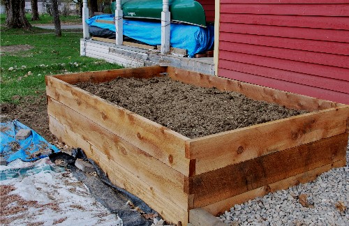 Here's one super garden raised garden bed--high enough to sit on while you weed.