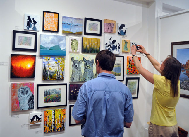This wall holding a mix of smaller works by local artists drew a lot of attention. David F. Rooney photo
