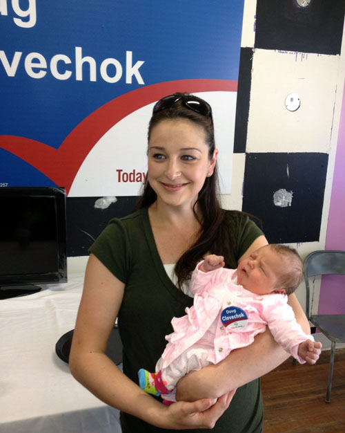 BC Liberal supporter Ashley Soberly dropped by the party's Revelstoke campaign office on Monday to show off her brand-new baby, Mia. The lovely baby girl will no doubt grow up to be as delightful as her mom... and, as you can see, she's already picking up her mom's taste in politics. Peter Bernacki photo