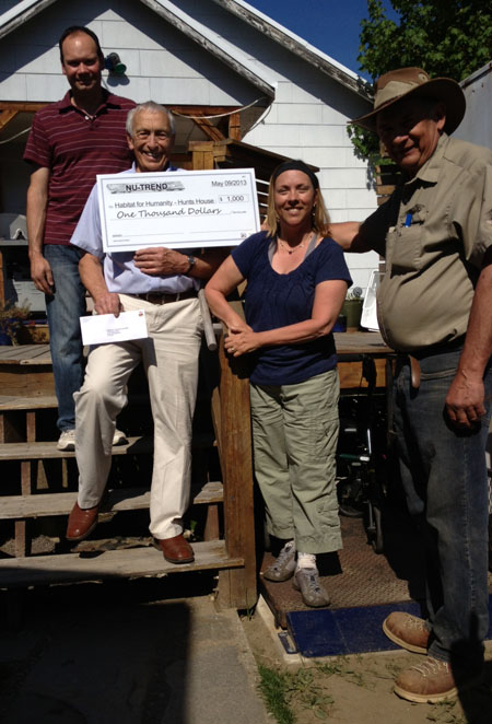 Pauline Hunt has good reason to smile: three local gentlemen dropped by Thursday afternoon with two cheques worth $6,000 toward the impending renovations to her Sixth Street home by the Habitat for Humanity and The Revelstoke Community Housing Society. Rotary Club President Ian Smith had a cheque for $5,000 from the Club and local builder Peter Bernacki provided a $1,000 cheque (which Signs Inc provided to him for free) from his company, Nu-Trend. The money will be used to pay for an expansion to Pauline's for-now-tiny home. The expansion by Habitat for Humanity and Revelstoke Community Housing Society will make Pauline's life much easier a she struggles with her illness, Amyotrophic Lateral Sclerosis. And that's former mayor and retired physician Geoff Battersby holding the cash.Photo courtesy of Peter Bernacki